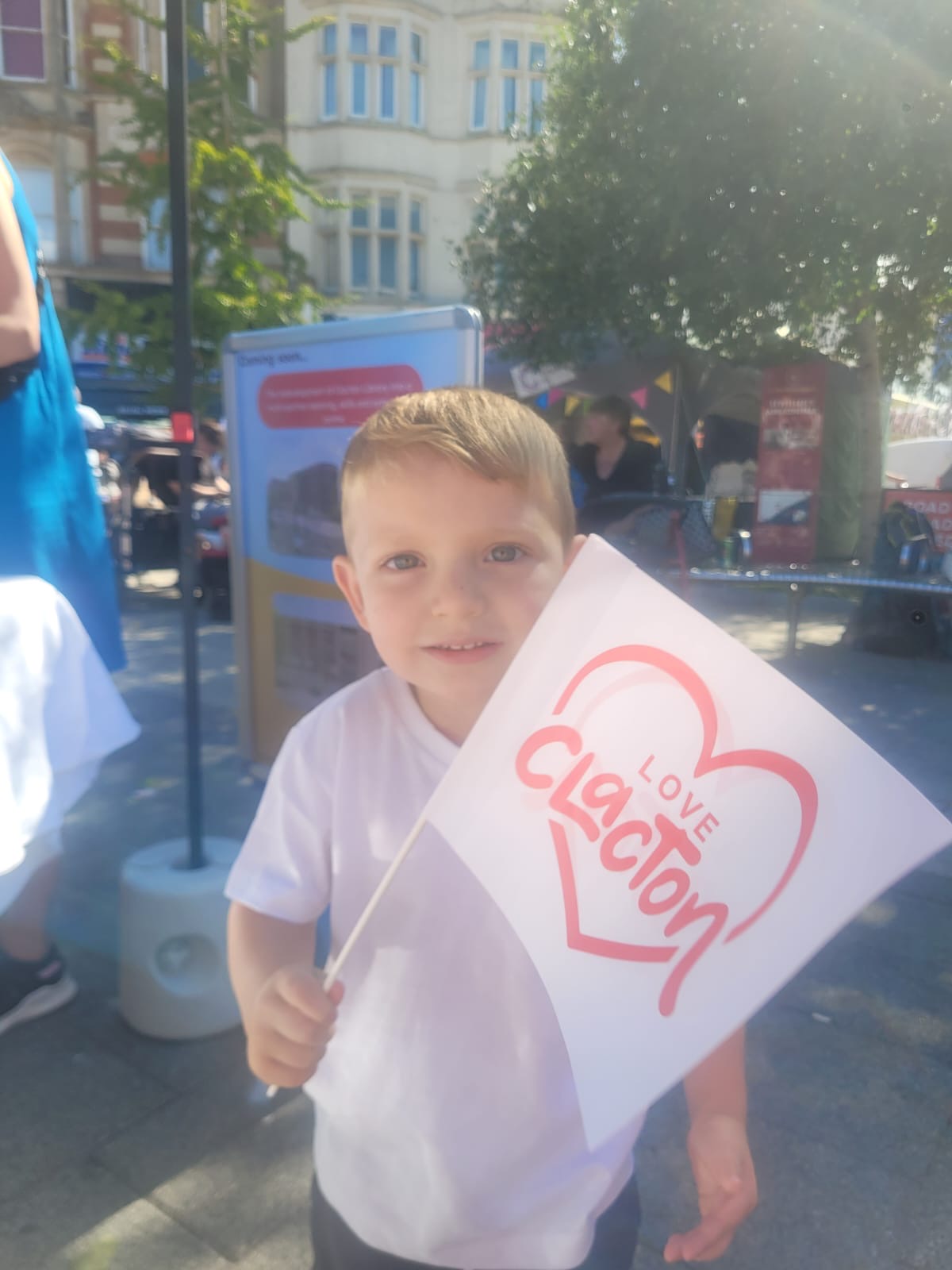young boy with Love Clacton flag